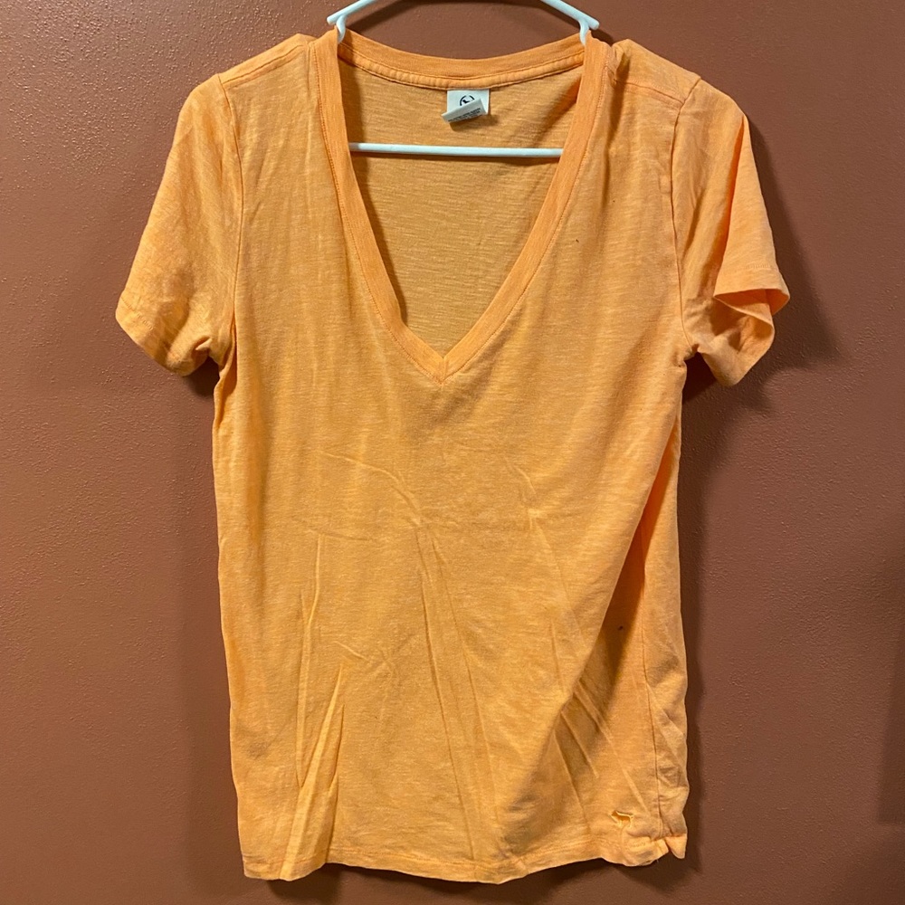 Women’s Victoria Secret Pink V Neck Short Sleeve Shirt.